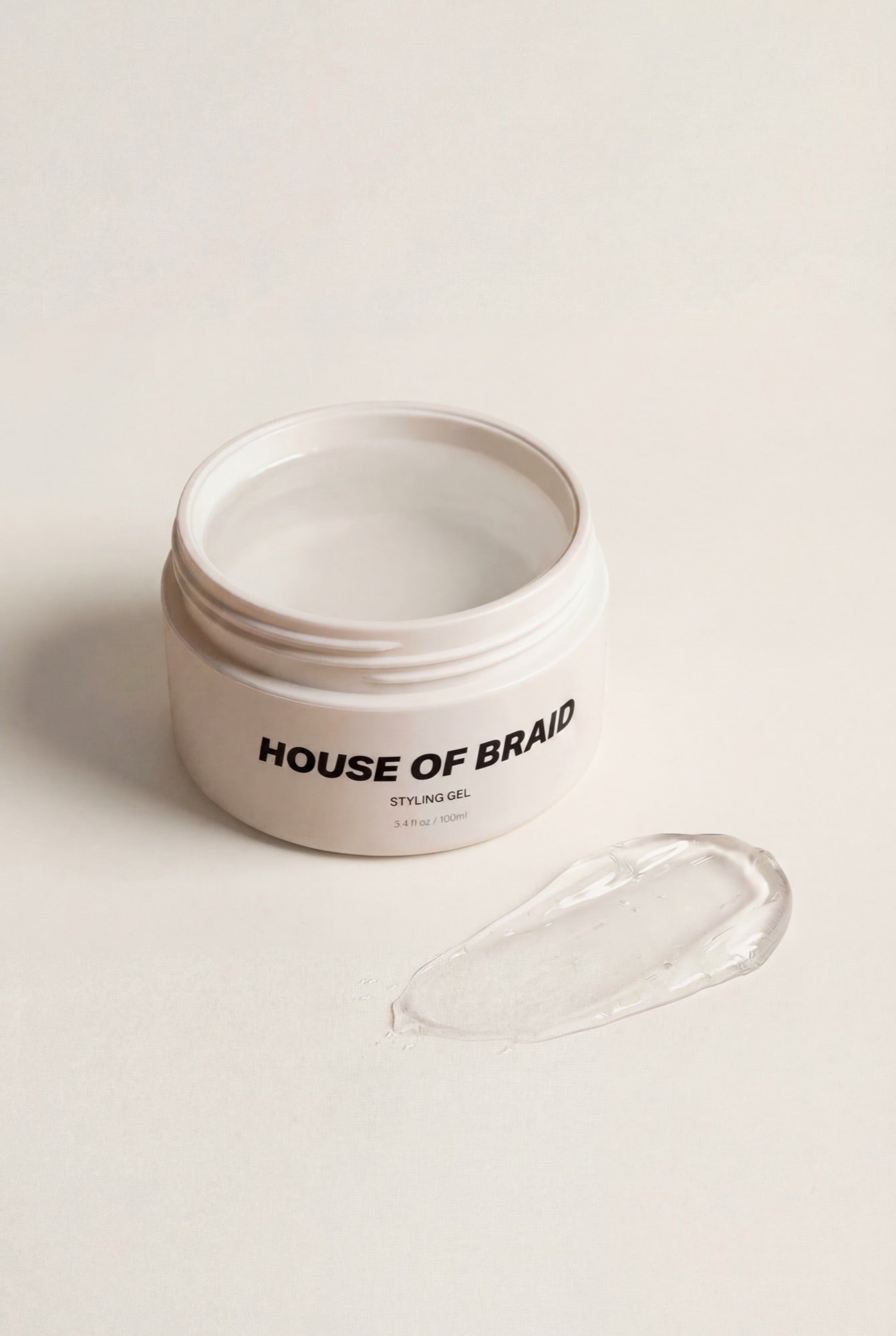 House of Braid Styling Gel jar with gel texture swatch